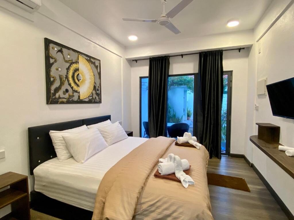 Guest room interior at Chillax Thoddoo, Thoddoo 1
